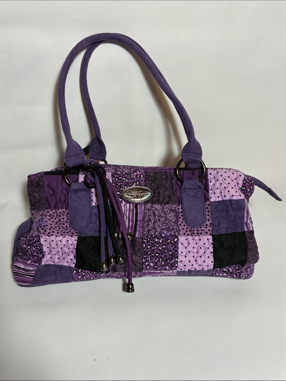 Donna Sharp Patchwork Purple Shoulder Bag with Tassel Detail